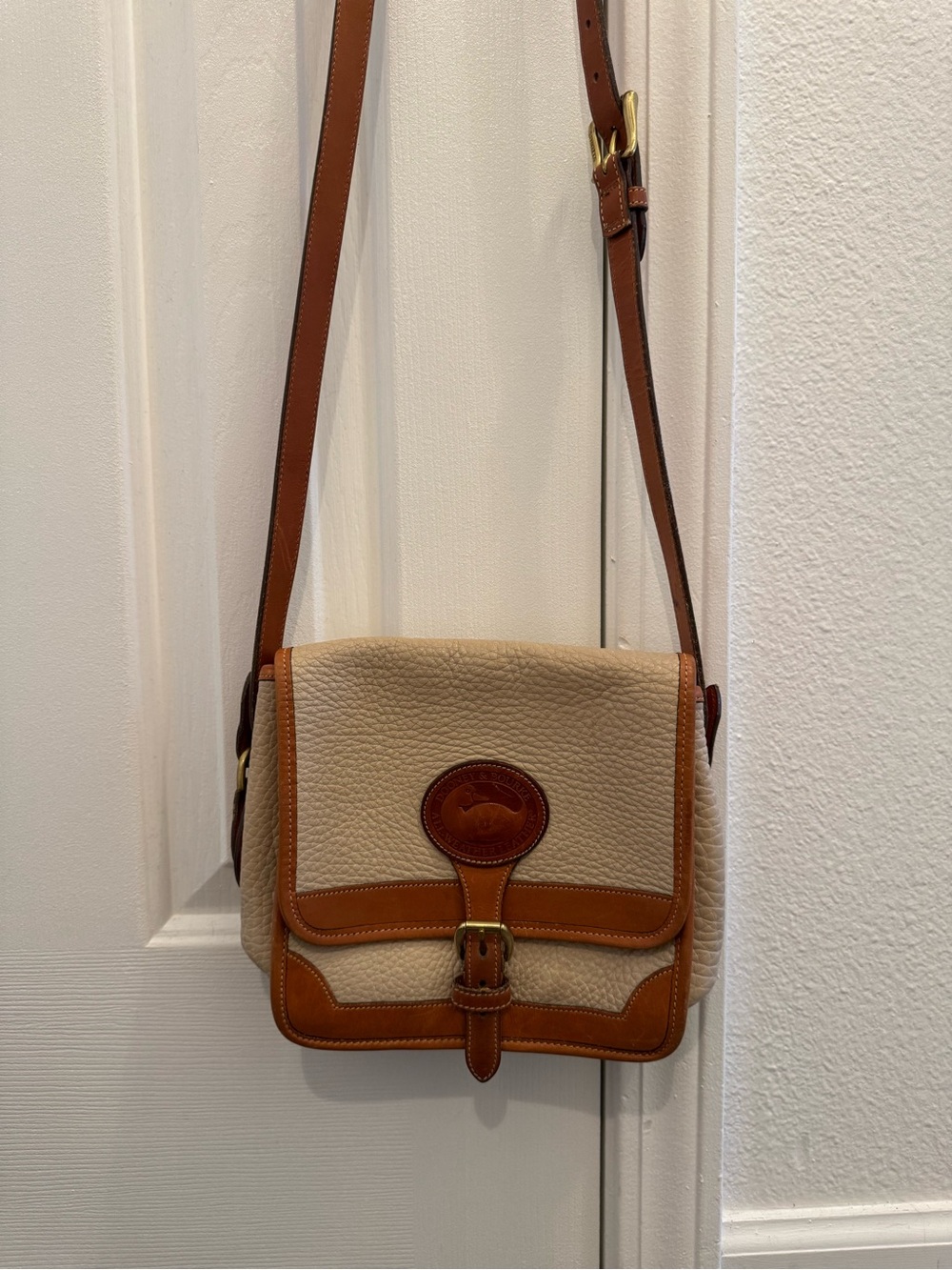 Dooney & Bourke Cream Pebbled Leather Satchel with Tan Trim